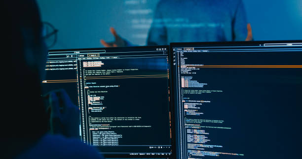 istock Group Asia male software developers mentor leader manager talk strategy plan to executive write prompt AI bot IT app program nomad, video game, designer, data center. Projecting slideshow code. 2180062176