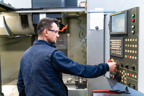 istock Professional lathe worker man working with milling machine in factory 2180065591