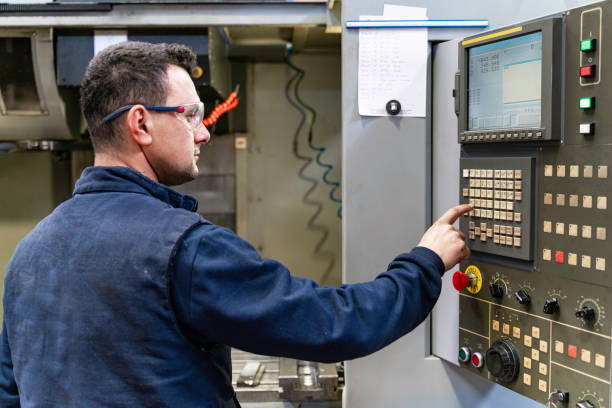 istock Professional lathe worker man working with milling machine in factory 2180065613