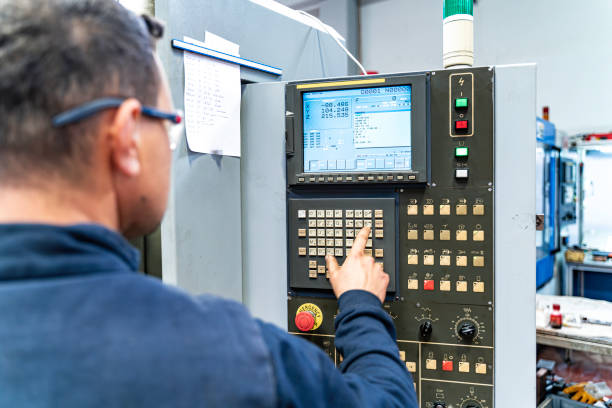 istock Professional lathe worker man working with milling machine in factory 2180065883