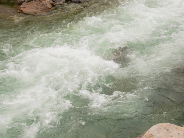 istock Alpine river in flood after heavy rains 2180066732