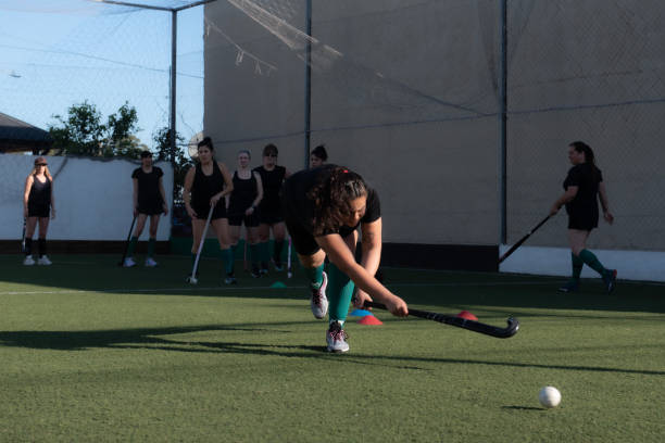 women mommy hockey in training