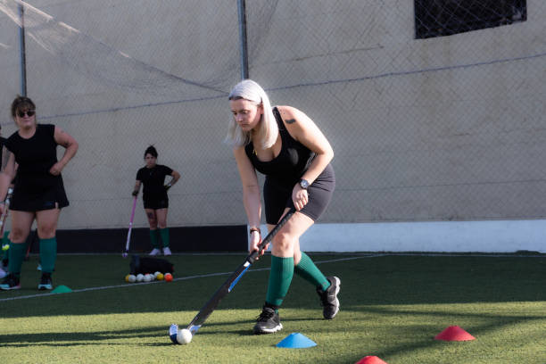 istock women mommy hockey in training 2180073753