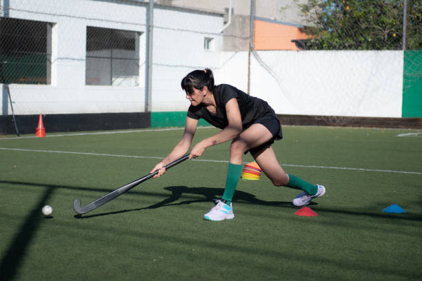 istock Woman playing Mommy hockey 2180074413