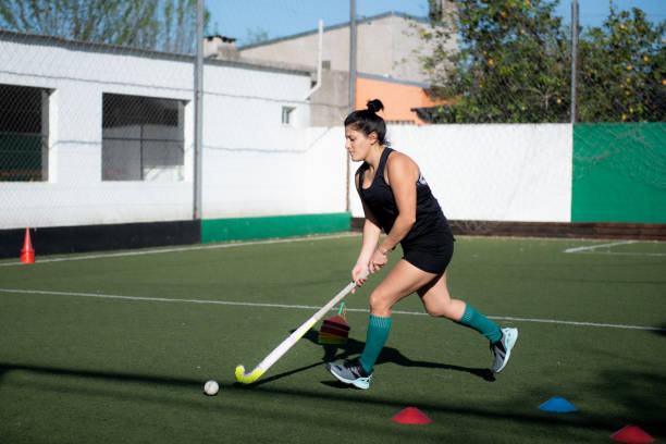 istock Woman playing Mommy hockey 2180074416