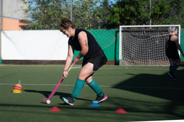 istock women mommy hockey in training 2180074426
