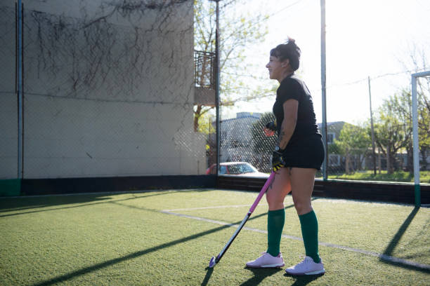 istock Woman playing Mommy hockey 2180074613