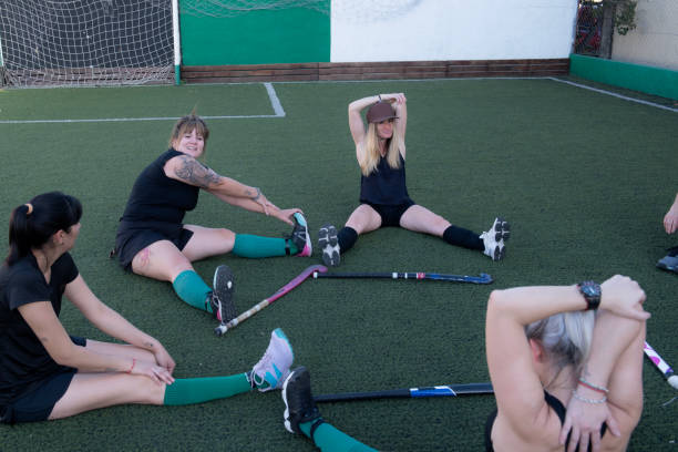 istock Hockey players stretching 2180075611