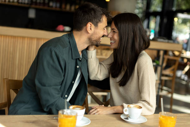 istock Young couple enjoying their time together in a cafe 2180077898