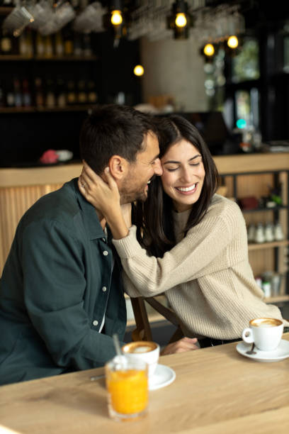 istock Young couple enjoying their time together in a cafe 2180077991