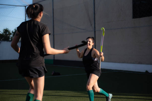 istock Field hockey players celebrating 2180078080