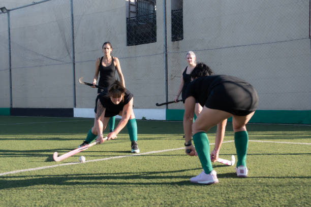 istock Field hockey players playing 2180078204