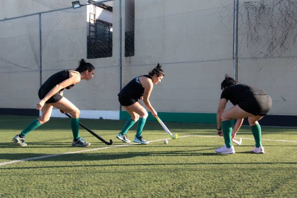 istock Field hockey players playing 2180078287