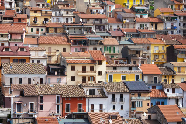Front view of the colored houses of Celano, a town among the mountains of Abruzzo, in Italy