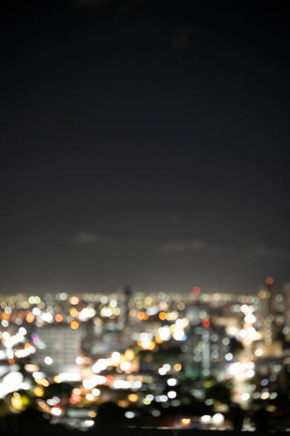 Blurred city night lights creating a background.