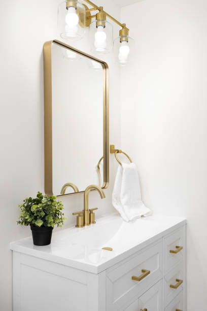 istock A bathroom detail with gold accents. 2180082076