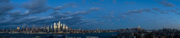 Panoramic view of Manhattan with beautiful sunset sky