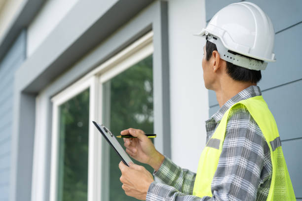 istock inspector or engineer is inspecting construction and quality assurance new house using a checklist. Engineers or architects or contactor work to build the house before handing it over to the homeowner 2180105777