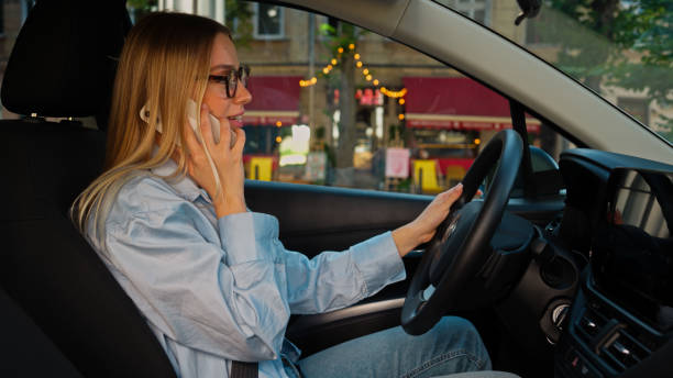 istock Woman and car 2180111682