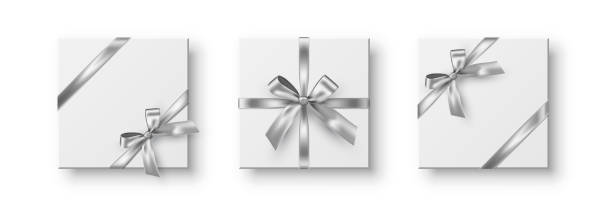istock Silver ribbons with bow set. Gift wrapping decoration on white background. Collection of present box decoration. Realistic 3d vector design elements 2180121775