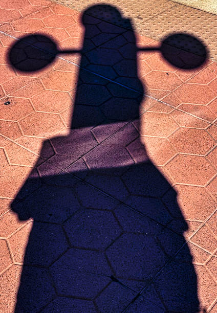 istock Shadow on the platform of a train station 2180123946