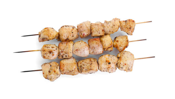 istock Delicious shish kebabs isolated on white, top view 2180130556