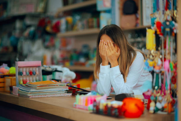 Tired store manager feeling depressed and suffering from burnout