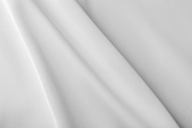 istock Texture of white silk ripple fabric as background, top view 2180133797