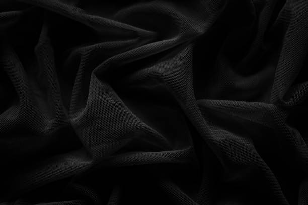 istock Black background plastic wrinkle bag film glossy crumpled overlay package rough wrap material pack reflection texture floor packaging retail grain pollution trash polyethylene, halloween backdrop. 2180136240