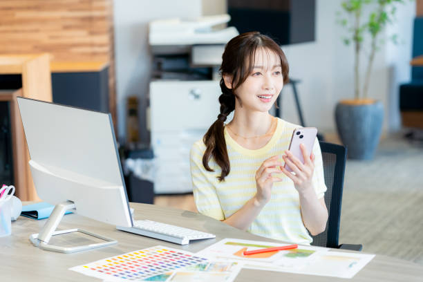 istock business woman working in the office 2180139744