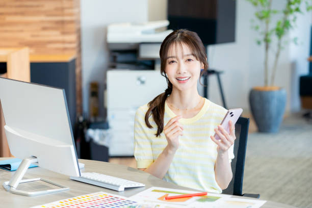 istock business woman working in the office 2180139757