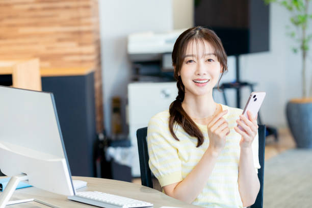 istock business woman working in the office 2180139824