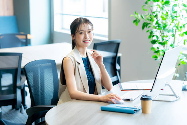 istock business woman working in the office 2180139865