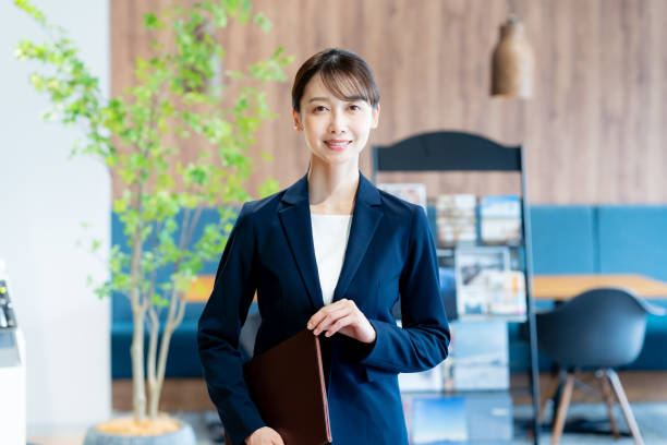 A female consultant working at the reception desk