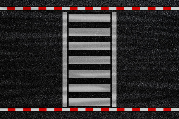 istock Empty crosswalk on asphalt road with red and white sign on sidewalk curb. top view 2180144114