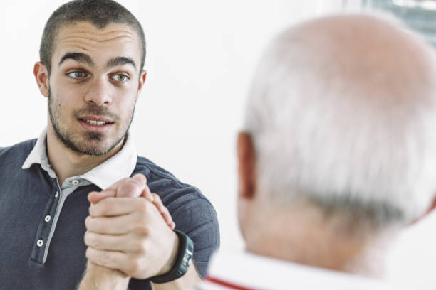 istock Young manager explaining business strategy to senior colleague 2180147128