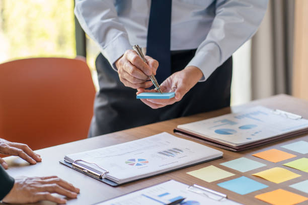 istock Business People brainstorming Meeting Design Ideas use post it notes to share idea professional investor start up project business brainstorming planning in office 2180150118