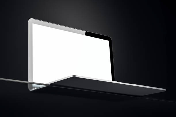 istock Laptop on glass stand with blank screen in low angle view. 3D Rendering 2180151009