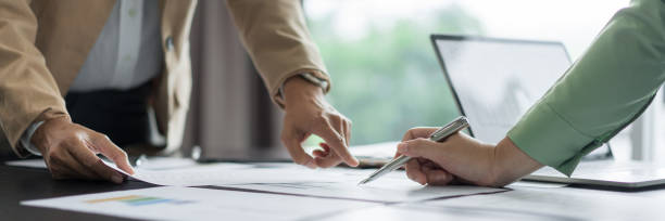 istock Alternative energy environment businesspeople discuss and brainstorming about renewable energy data 2180152492