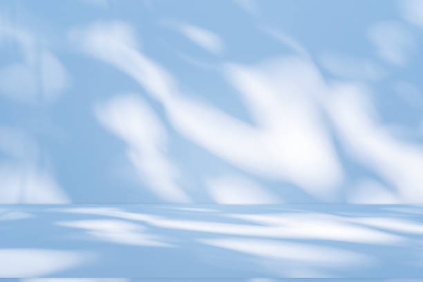 istock Studio style background wall decoration presentation uses white and blue tones. with shadows cast from a nearby window, concept creating a decorative 2180154161