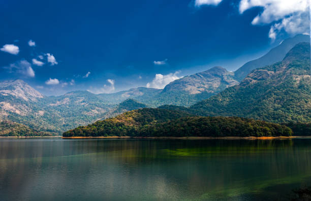 istock A beautiful Dam surrounded by Mountains under the dramatic blue sky, Aesthetic view of Pothundi Dam, Palakkad. 2180157561