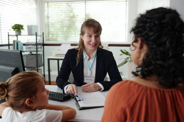 istock Social Worker Having Meeting With Family 2180158304