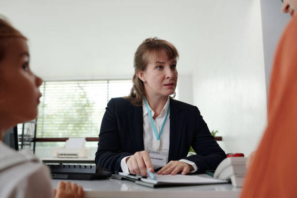 istock Social Worker Discussing Adoption With Woman 2180158306