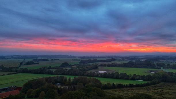 istock Countryside landscape at sunset with vibrant sky. 2180159798