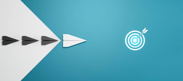 istock Leadership concept, White leader plane leading black plane, on blue background. 2180162139