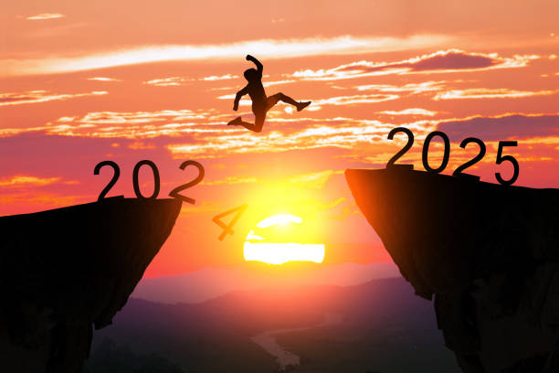 istock Person Jumping from 2024 to 2025 Cliff 2180166326