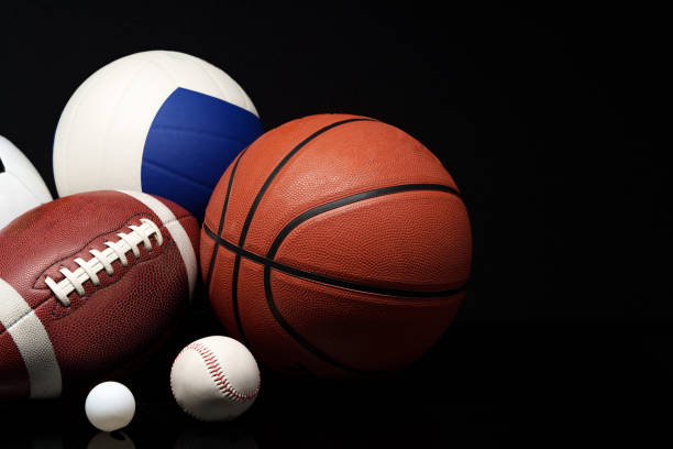 istock Various sports equipment on black background studio shot 2180168368
