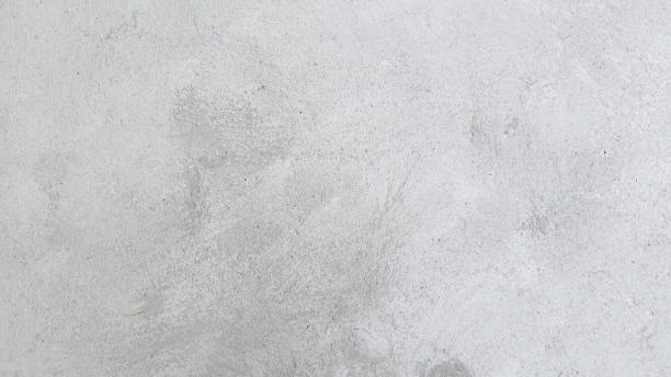 istock White cement textured wall background. concrete polished material texture background. 2180170964