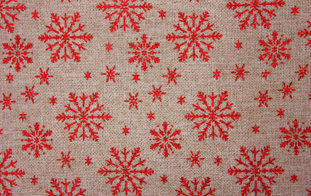Christmas burlap background with snowflakes