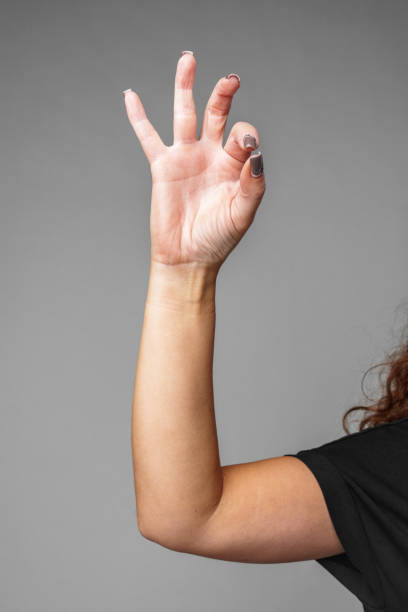 istock signaling a small size against a gray background 2180179211